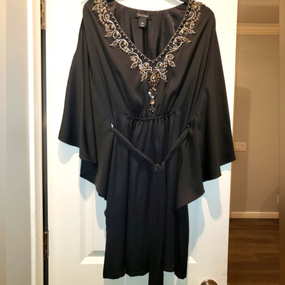 Elegant Black Dress with Embellished Neckline